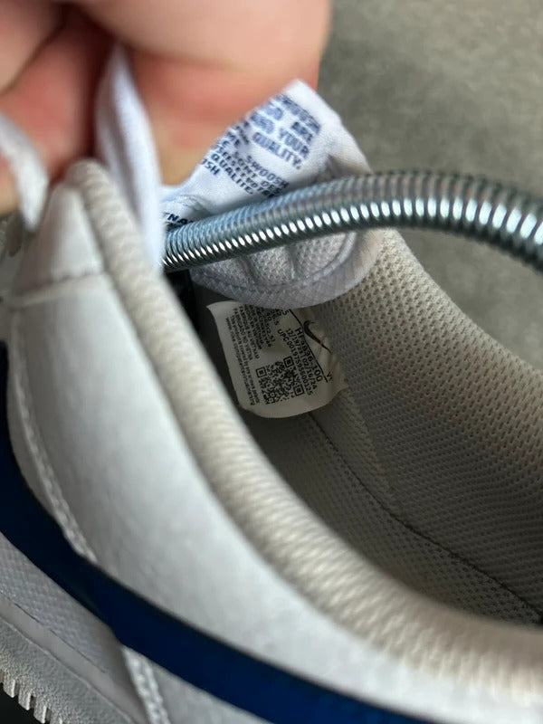 Nike air force ones white with blue swoosh